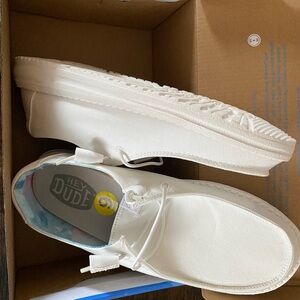 Brand new NEVER WORN. Woman’s Hey Dude White shoes. Wendy’s.